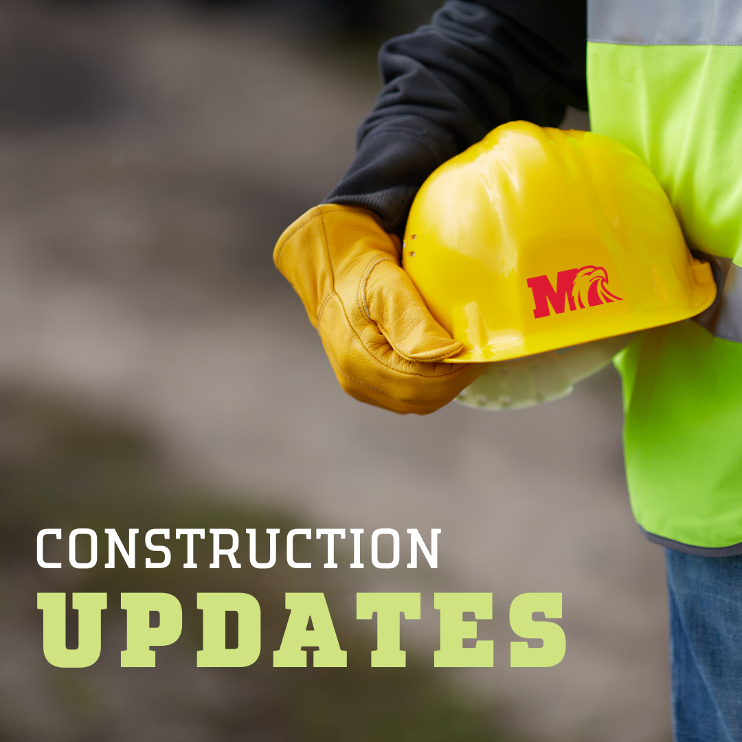 "Construction Updates" poster with man holding Milford hardhat